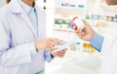Two doctors discussing medication.